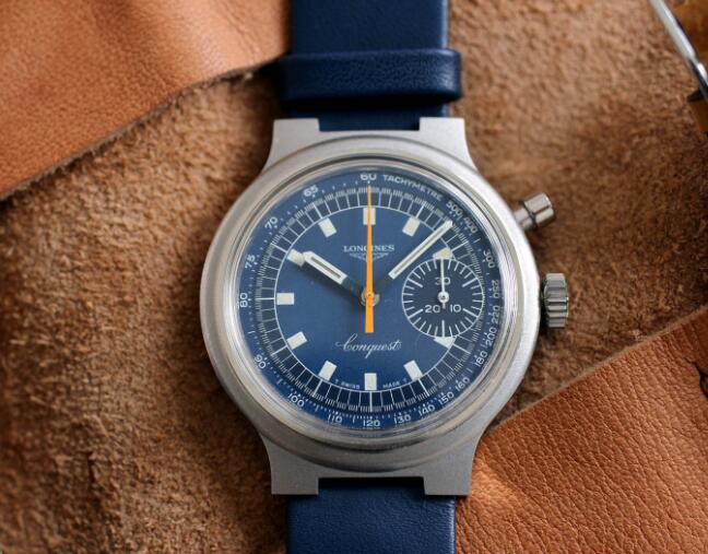 The orange second hand is striking on the dial.