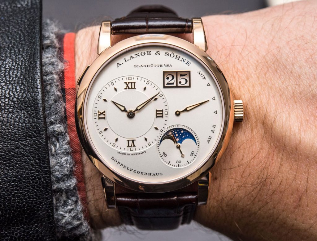 The 18k rose gold fake watch has silvery dial.